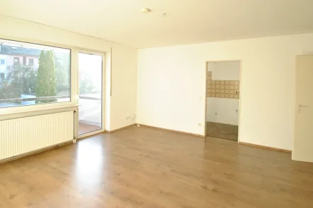 Wohnzimmer - Wohnung kaufen in Neu-Isenburg - 2-Zimmer-Wohnung mit Balkon in guter Lage von Neu-Isenburg!