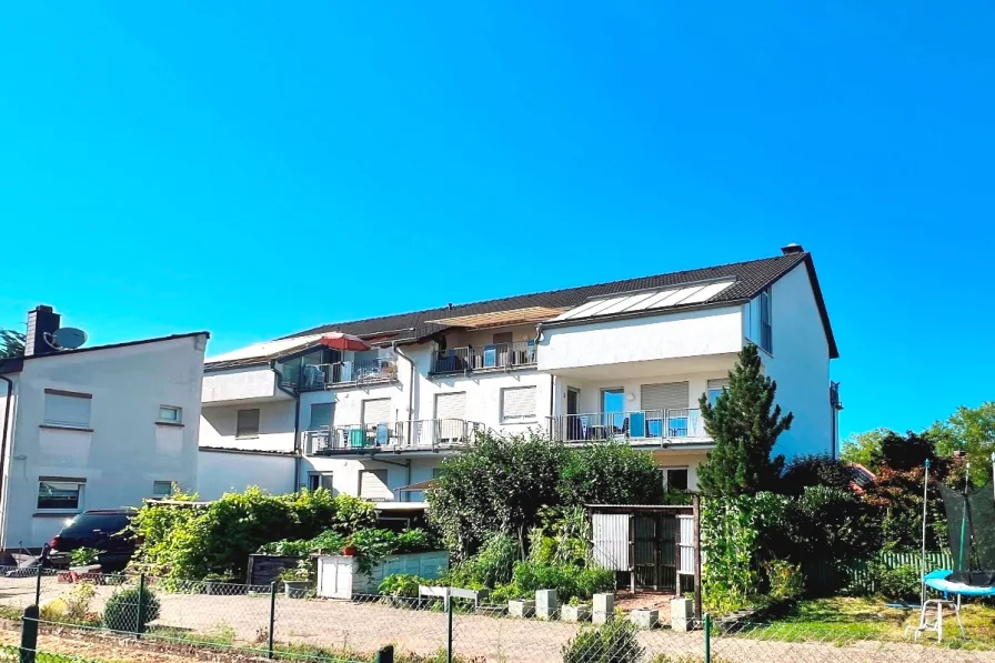 Außenansicht  - Wohnung kaufen in Dreieich - Moderne Erdgeschosswohnung mit großer Terrasse und Garten in begehrter Lage von Dreieich-Sprendlingen