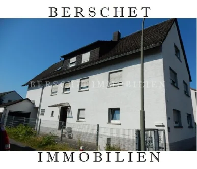  - Haus kaufen in Mühlheim am Main - Kapitalanlage, 3-Familienhaus mit Garage und kleinem Garten in Mühlheim/Dietesheim am Main