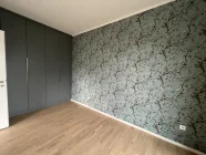 Schlafzimmer mit Einbauschrank