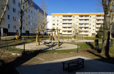 Spielplatz - Wohnung mieten in Bad Düben - Familienfreundliche 4 Zimmerwohnung mit Balkon in ruhiger Anlage