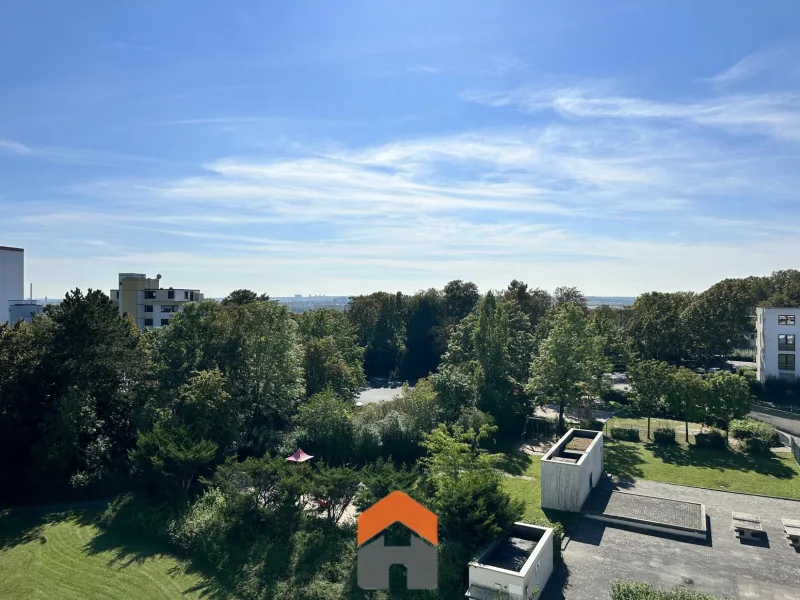 Ausblick - Wohnung kaufen in Wiesbaden - Lichtdurchflutete Räume und ein wohltuender Blick ins Grüne