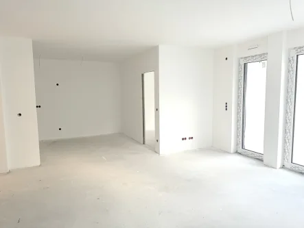 Wohnzi. 1.OG WE 3 - Wohnung kaufen in Seeheim-Jugenheim / Jugenheim - Energieeffizienter Neubau in Bevorzugter Wohnlage, Barrierefrei, 3-Zi. ETW mit 2 Balkon´s