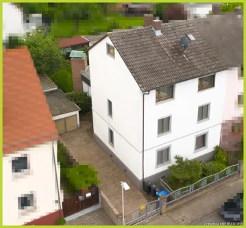 Hausansicht Straße - Haus kaufen in Langen - Ein- bis Zweifamilien Stadthaus mit Anbau in attraktiver Lage von Langen