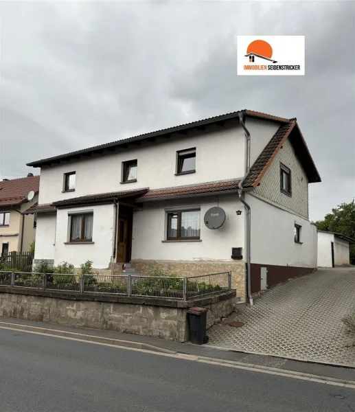 Einfamilienhaus mit Garage - Haus kaufen in Veilsdorf - Geräumiges Einfamilienhaus mit Garage nahe Hildburghausen