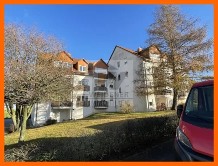 Ansicht  - Wohnung kaufen in Kleinbocka - Interessante Investitionsmöglichkeit: Vermietete 2-Zimmer-Wohnung mit Balkon und Carport