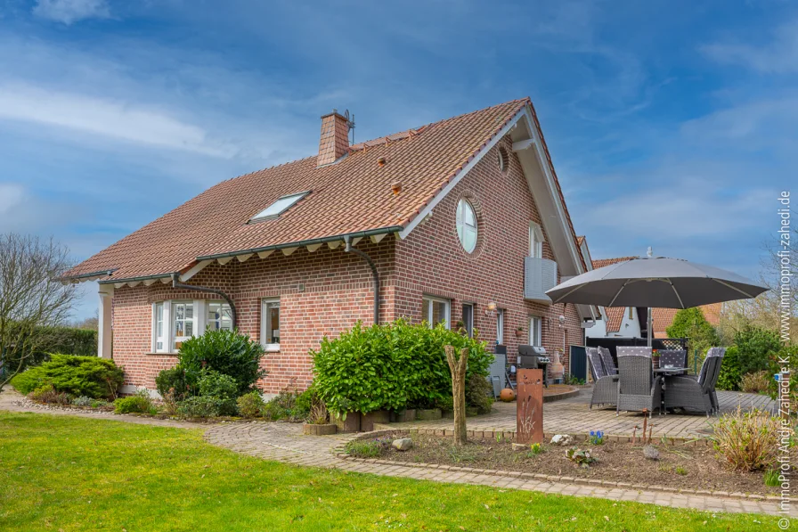 Traumhaus in Dieburg - Haus kaufen in Dieburg - Ein Traum in Klinker: Exklusives Familienidyll mit Wintergarten in Dieburg
