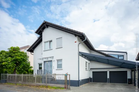 2-3 Familienhaus in Weiterstadt - Haus kaufen in Weiterstadt - Freistehendes 2-Familienhaus mit Wintergärten u. ELW in Weiterstadt