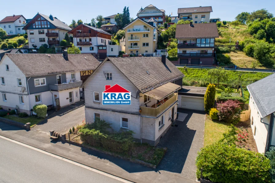 Luftaufnahme - Haus kaufen in Angelburg - ++ KRAG Immobilien ++ Balkon, Terrasse, Garten, Garagen! Traum für Eigenleister ++