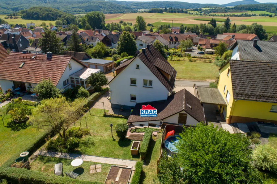 Luftaufnahme - Haus kaufen in Lohra - ++ KRAG Immobilien ++ 2 Kinderzimmer oder mehr ++ 3 Bäder, Garten ++ in Waldnähe