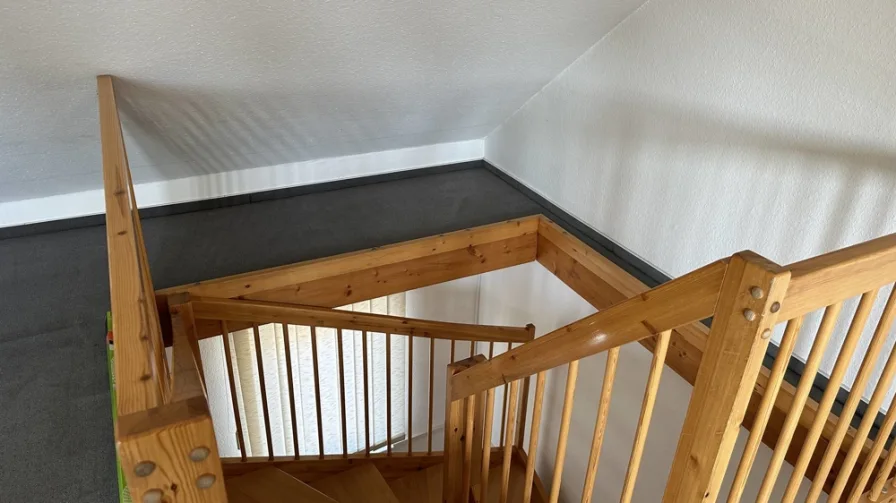 Treppe vom Obergeschoss uns Dachgeschoss