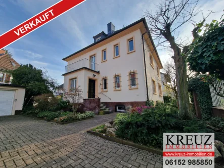 onoffice-Titelbild verkauft - Haus kaufen in Rüsselsheim - Beeindruckend imposante Villa mit Potential