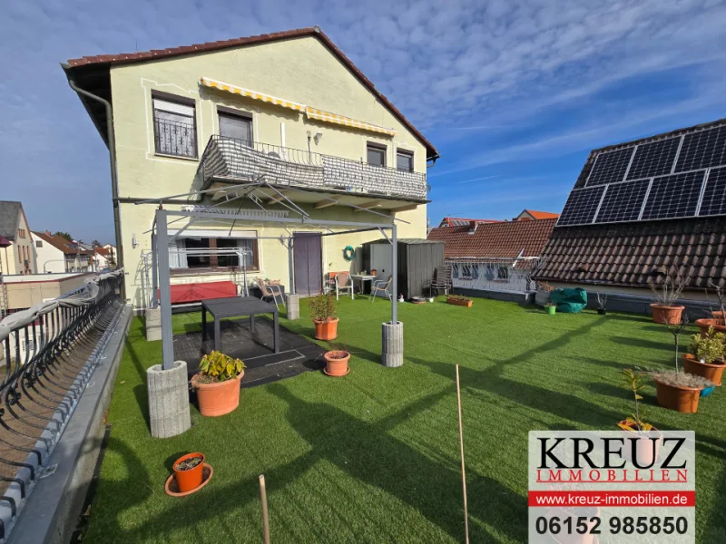 onoffice-Titelbild - Wohnung kaufen in Groß-Gerau/Dornheim - Großzügige 4-Zimmerwohnung mit sonnenverwöhnter Südwest Terrasse in Dornheim