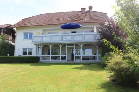 Gartenansicht - Haus kaufen in Bad Soden-Salmünster - *Reserviert* Schönes Einfamilienhaus mit Einliegerwohnung (Mehrgenerationshaus) in gepflegtem Zustand