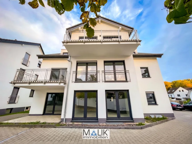 Außenansicht - Wohnung kaufen in Kelkheim - PROVISIONSFREI: Gut geschnittene 4-Zimmer-Wohnung mit Terrasse