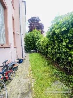 Garten hinten - Haus kaufen in Frankfurt am Main - Seltenes Stilaltbaujuwel mit perfekten Grundrissen in top Nordendlage - Invest / Teilselbstnutzung