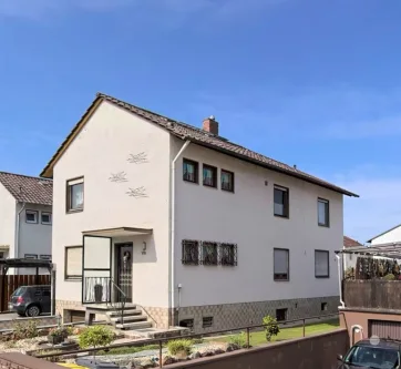 Hausansicht - Wohnung kaufen in Budenheim - MZ Budenheim; Sonnige, ruhige 3-ZKB/Balkon & Loggia! Garage! Kl. Einheit! Freigestellt!