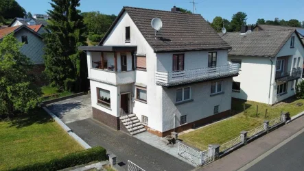 Blick auf das Haus - Haus kaufen in Grebenau - DIE KOMBINATION AUS ANLAGE UND EIGENNUTZUNG! KEINE KÄUFERPROVISION!