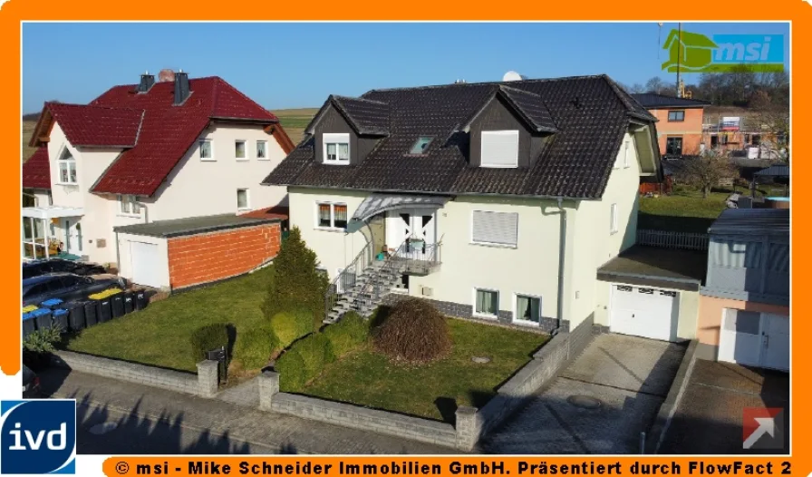 Blick auf das Anwesen - Haus kaufen in Kirtorf - WERTIGES UND GEPFLEGTES 3-FAMILIENHAUS IN EXPONIERTER LAGE! KEINE KÄUFERPROVISION!
