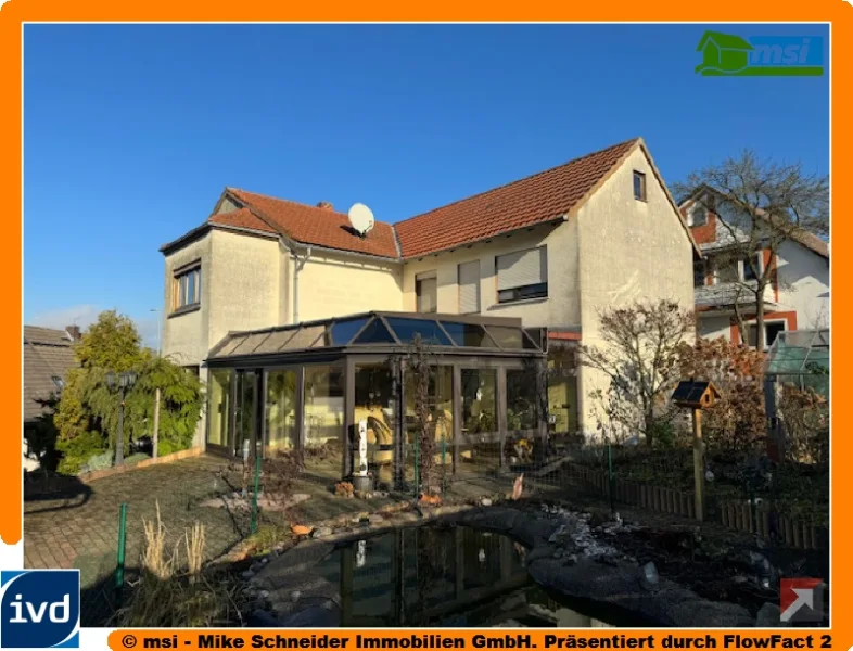 Blick auf den Wintergarten - Haus kaufen in Alsfeld - FAMILIENHEIM MIT FERNBLICK UND WINTERGARTEN! KEINE KÄUFERPROVISION!