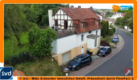 Straßenansicht - Haus kaufen in Grebenau - PREISWERT WOHNEN AM ORTSRAND! KEINE KÄUFERPROVISION!
