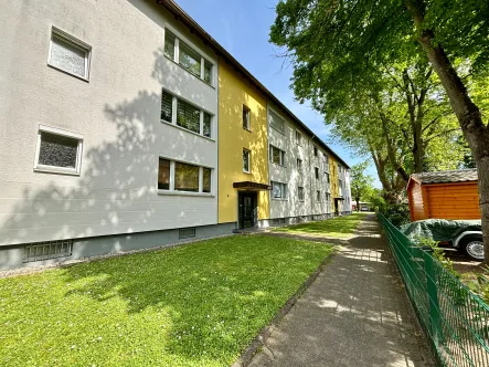 Eingangsbereich des Hauses - Wohnung kaufen in Hanau - Sofort verfügbar: moderne Etagenwohnung mit Balkon und Stellplatz