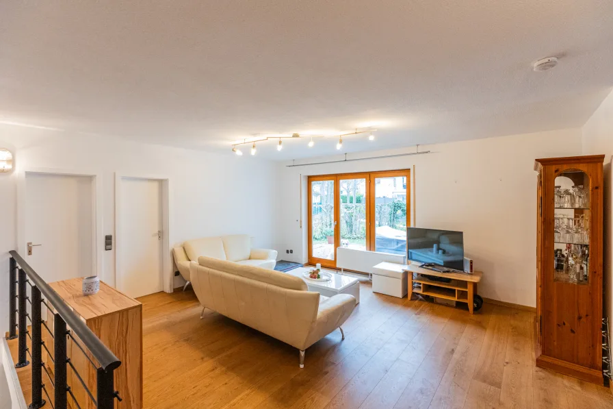 Ansicht 1 Wohnzimmer - Wohnung kaufen in Klein-Winternheim - Ländlich, aber doch stadtnah! 4-Zimmer-Maisonette-Wohnung mit Garten und Stellplatz