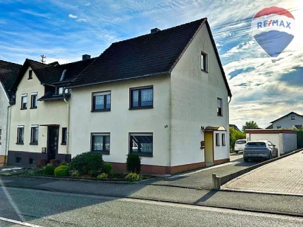 01 Außenansicht - Haus kaufen in Roth-Öttershagen - Einfamilienhaus mit Garage und Garten in Roth-Öttershagen