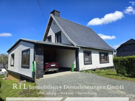 Außenansicht - Haus kaufen in Bad Lobenstein  - Entspanntes Wohnen im Grünen: Einfamilienhaus in idyllischer Lage