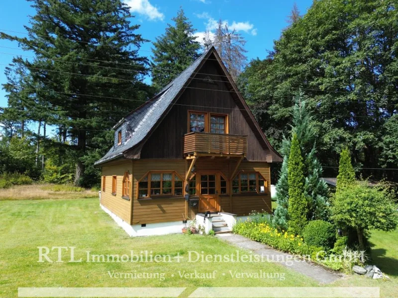 Ansicht - Haus kaufen in Wurzbach - Charmantes Holzhaus in ruhiger Lage!