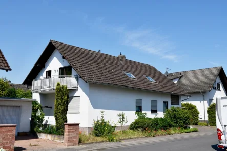 - Haus kaufen in Babenhausen-Hergershausen - Großzügiges Zweifamilienhaus in Massivbauweise in angenehmer Wohnlage von Babenhausen-Hergershausen