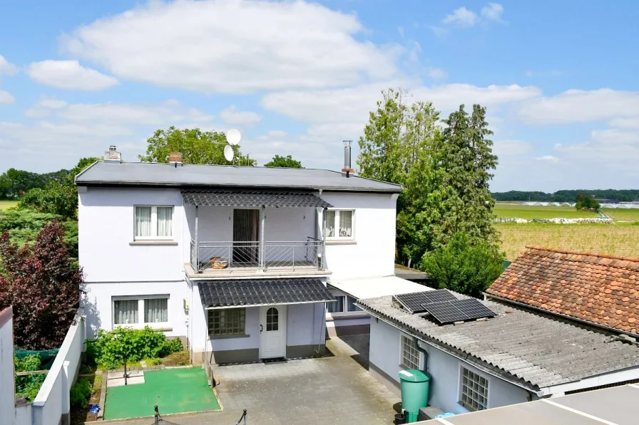 Hausansicht - Haus kaufen in Darmstadt-Arheilgen - **RESERVIERT** Vielseitig nutzbares Ein- bis Zweifamilienhaus in attraktiver Lage von Darmstadt-Arheilgen