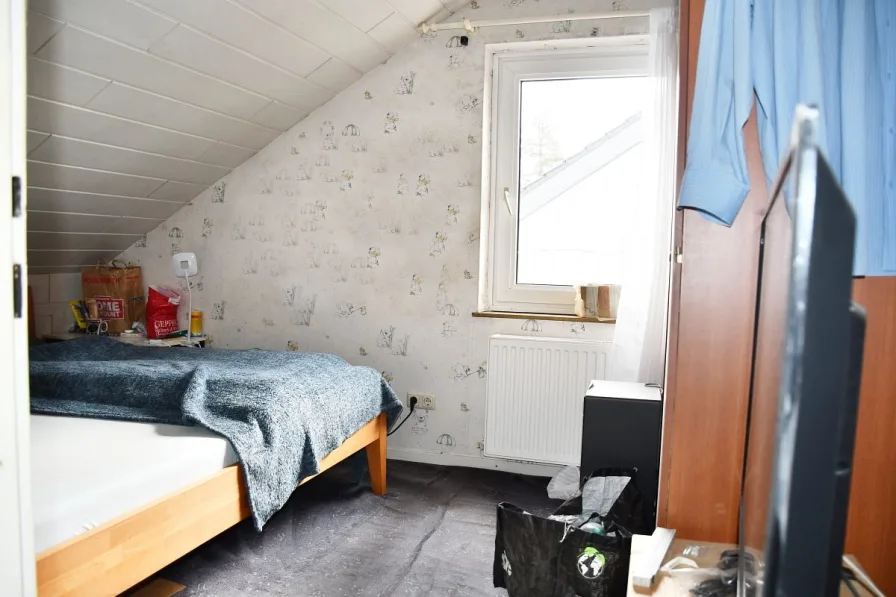 Wohnung DG - Schlafzimmer