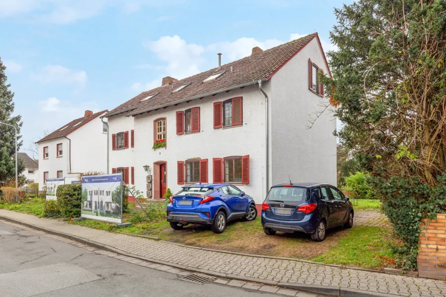 Außenansicht - Wohnung kaufen in Hattersheim - Kapitalanlage - Gepflegte 4-Zimmerwohnung mit Balkon