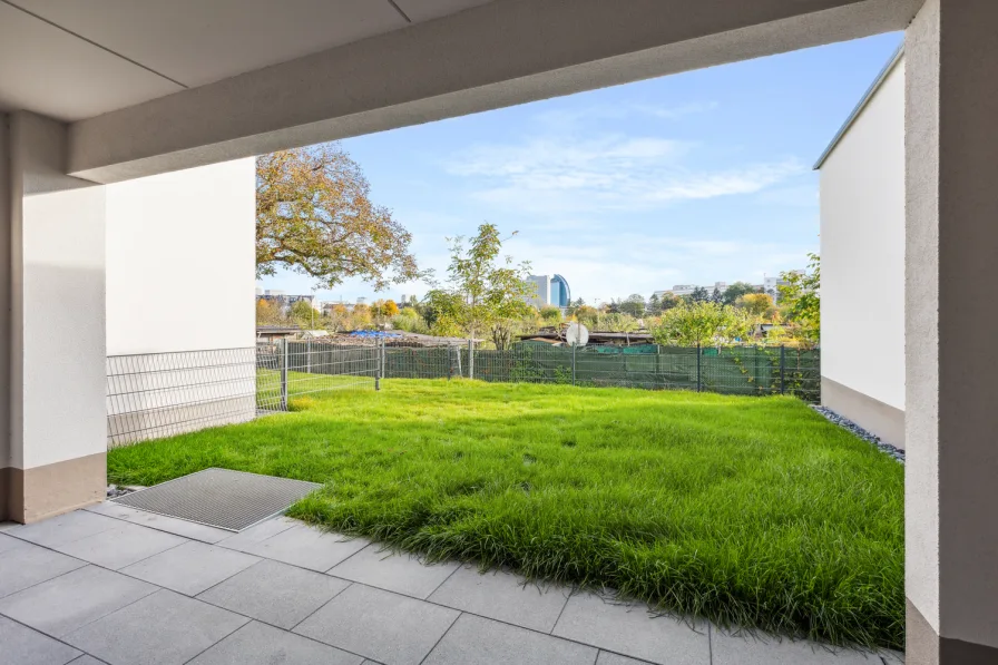 Garten - Wohnung kaufen in Frankfurt - Gartenwohnung mit Skyline-Blick - Erstbezug im Effizienzhaus 40