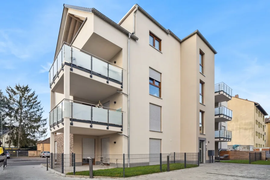 Außenansicht Hof - Wohnung kaufen in Frankfurt am Main / Sindlingen - A+ - Moderne 1-Zimmer Neubauwohnung mit EBK