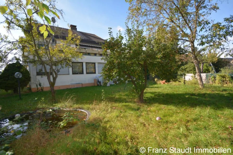 Gartenansicht - Haus kaufen in Stockstadt - Vermietetes Wohnhaus mit großem Garten in bevorzugter Lage