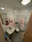 Badezimmer mit WC und Dusche