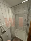 Badezimmer mit WC und Dusche