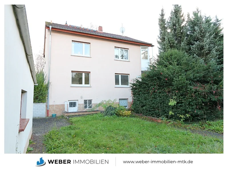 Gartenseite - Haus kaufen in Hattersheim am Main - **Freistehendes, sanierungsbedürftiges 2-Familienhaus auf großem Grundstück**