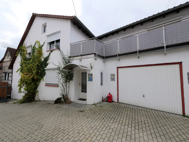 Titelbild - Haus kaufen in Wiesbaden / Naurod - Zeitgemäßer Komfort Charmantes Zweifamilienhausin sehr begehrter Lage von Wiesbaden-Naurod