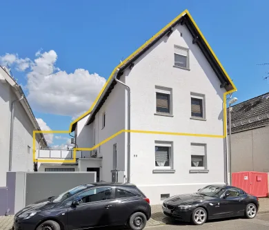 Straßenansicht Kompletthaus - Wohnung kaufen in Raunheim - Top gepflegtes Haus im Haus 1. OG und DG für 1 oder 2 Familien