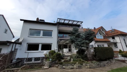 Gartensansicht - Haus kaufen in Raunheim - 5-Familienhaus in Stadtrandlage