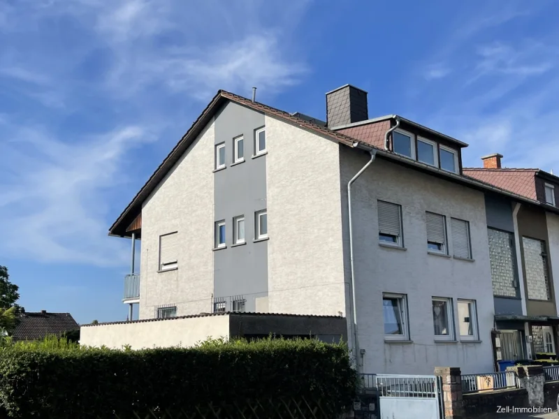 Startbild - Haus kaufen in Rüdesheim am Rhein - Mehrfamilienhaus mit 3 Eigentumswohnungen in beliebter Wohnlage von Rüdesheim