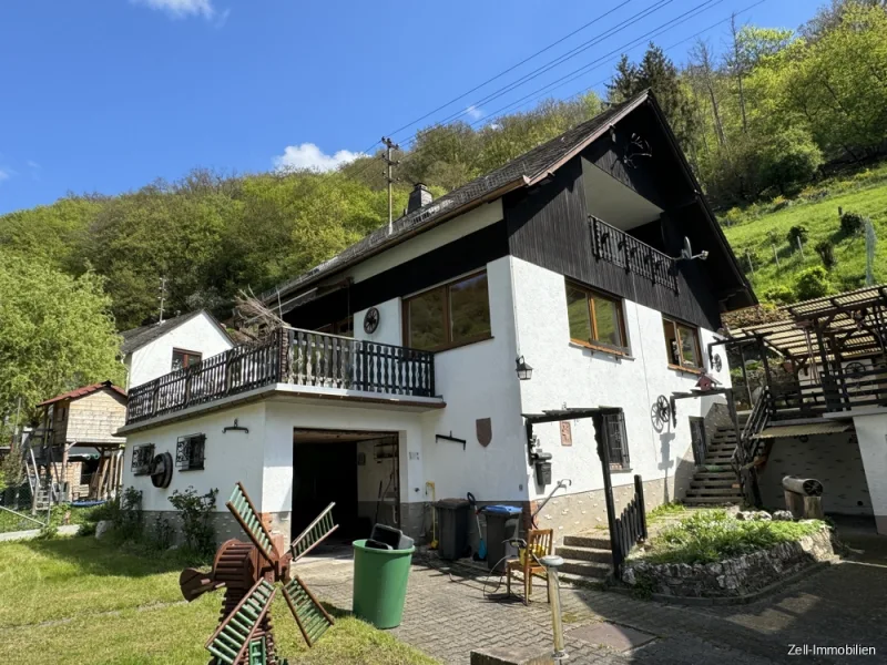 Titelbild - Haus kaufen in Sauerthal - Einfamilienhaus mit Terrasse, Garage und Garten in ruhiger Lage von Sauerthal