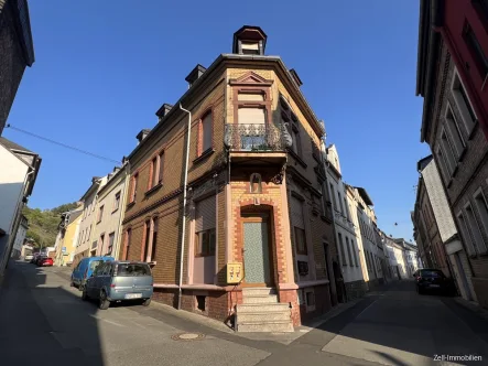 Ansicht - Haus kaufen in Lorch / Lorchhausen - Vermietetes Zweifamilienhaus in Lorchhausen zu verkaufen