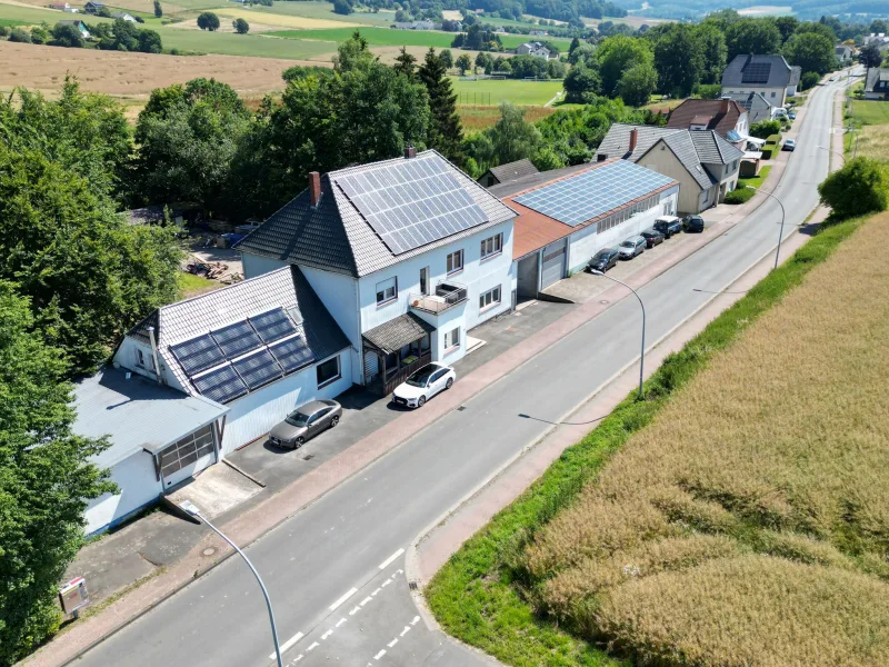 Titelbild - Haus kaufen in Preußisch Oldendorf - Solides Wohn&Geschäftshaus mit Potenzial in Preußisch Oldendorf