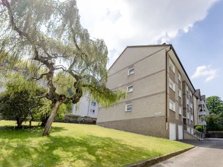 Hausansicht - Wohnung kaufen in Hagen - Mit Garage und Loggia: Ideal geschnittene Eigentumswohnung in beliebter Lage