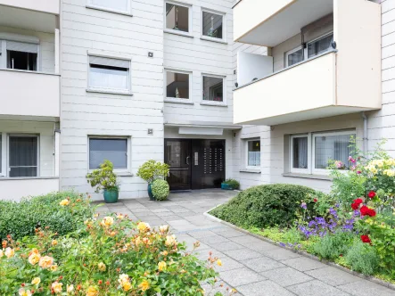 gepflegter Eingangsbereich - Wohnung kaufen in Hagen - Über den Dächern von Hagen: Eigentumswohnung mit Balkon und schöner Weitsicht