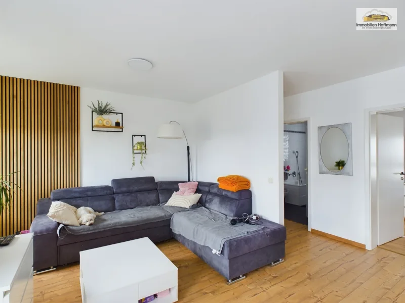 Wohnzimmer.. - Wohnung kaufen in Karben - Moderne Eigentumswohnung in Karben – Großzügig und ideal gelegen